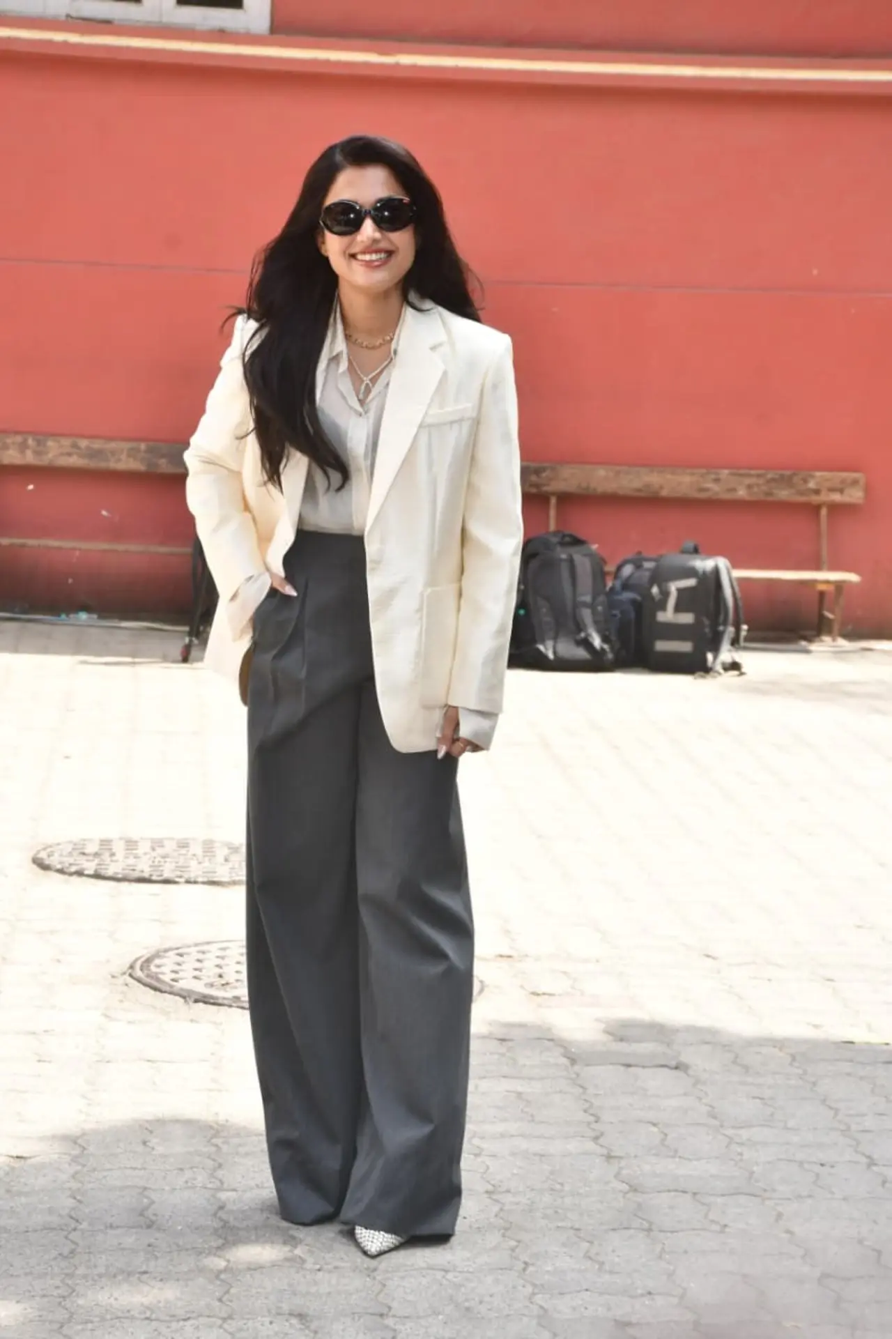 Rashmika Mandanna looked classy in an oversized ivory blazer teamed with a white shirt and charcoal wide-leg trousers. Rashmika Mandanna looked classy in an oversized ivory blazer teamed with a white shirt and charcoal wide-leg trousers.